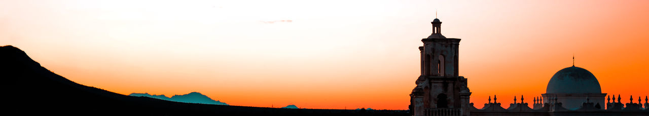 Silhouette of buildings at sunset