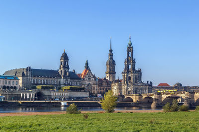 View of buildings against blue sky