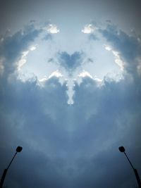 Low angle view of street light against sky