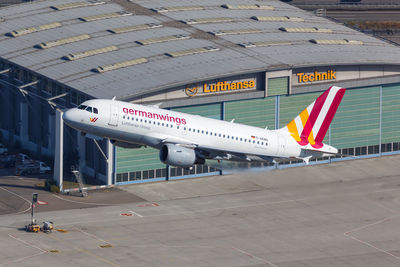 View of airplane at airport runway