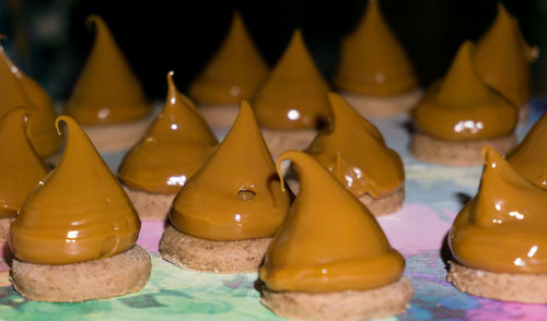 Close-up of yellow candles on table