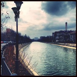 View of river against cloudy sky