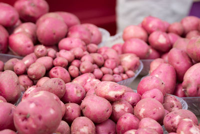 Close-up of red potatoes on market stall