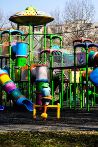 View of playground in park against sky