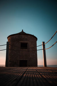 Low angle view of old building against sky