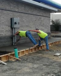 Full length of woman standing on wall