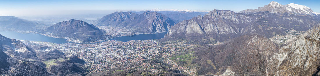 Extra wide view of the lake of lecco and the lake of garlate and the sorrounding mountains