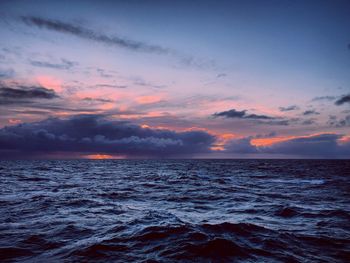 Scenic view of sea against dramatic sky