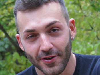 Close-up portrait of smiling young man