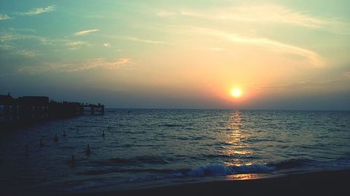 Scenic view of sea at sunset