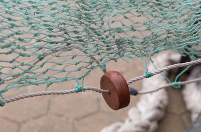 Close-up of fishing net outdoors