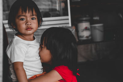 Portrait of cute girl at home