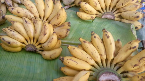 High angle view of bananas on leaf at market stall