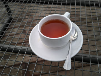 High angle view of coffee cup on table