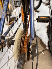 High angle view of bicycle on street with rusty chain after winter outside. bike needs to be repaire