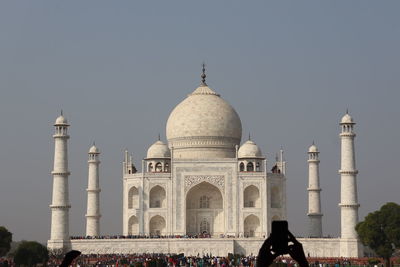 Low angle view of mosque against clear sky