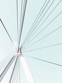 Low angle view of suspension bridge against clear sky