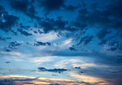 Low angle view of clouds in sky during sunset