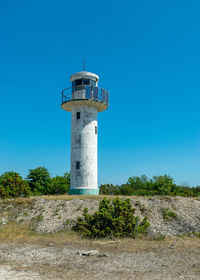 Summer view of an old abandoned lighthouse by the sea, saaremaa island, estonia