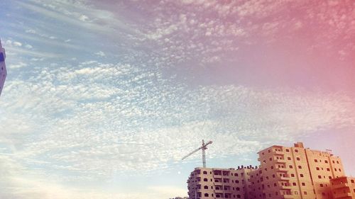 Low angle view of modern building against sky