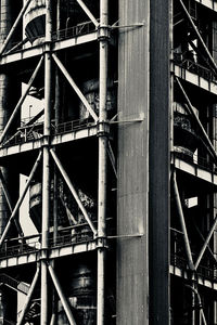 Low angle view of building under bridge