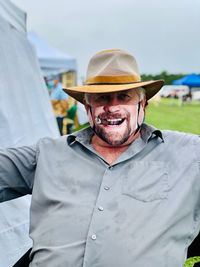 Portrait of man wearing hat