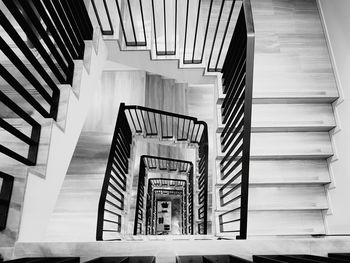 Low angle view of spiral staircase in building