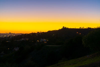 High angle view of cityscape against sky during sunset