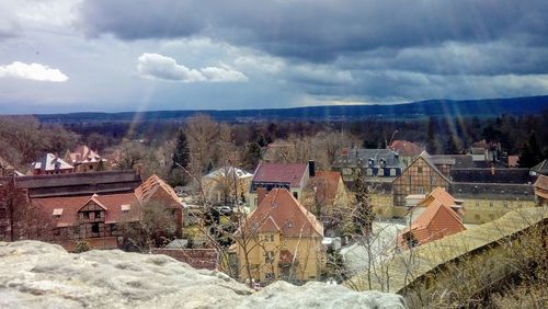 Aerial view of townscape against sky