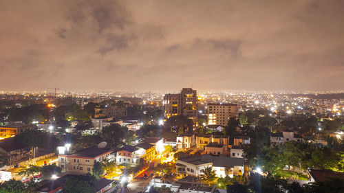 High angle view of illuminated buildings in city
