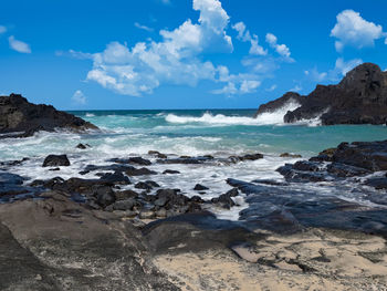 Scenic view of beach against sky