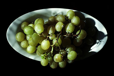 Directly above shot of grapes in plate