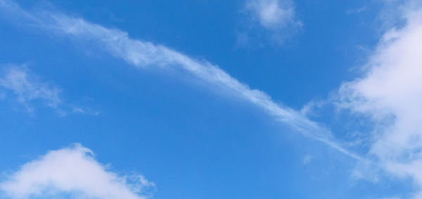 Low angle view of vapor trail in sky