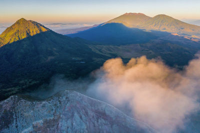 Panoramic view of volcanic mountain range against sky