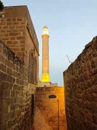 Low angle view of fort against clear sky