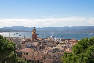 High angle view of town by sea