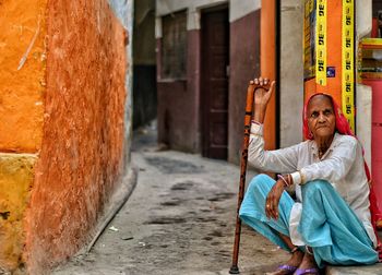 View of woman standing on wall