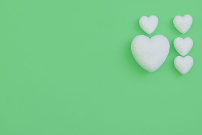 Close-up of heart shape over white background