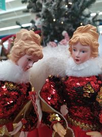 Portrait of woman with christmas tree