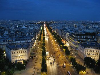 High angle view of illuminated city street at night