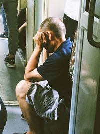 Man sitting in train