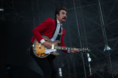 Young man playing guitar