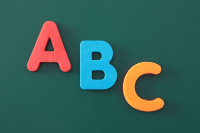 Alphabet abc magnets on green board