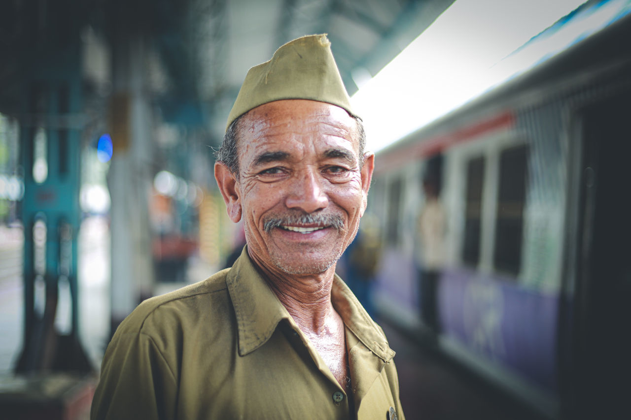 portrait, one person, headshot, smiling, looking at camera, focus on foreground, adult, senior adult, men, front view, real people, clothing, senior men, males, happiness, emotion, lifestyles, mature adult, standing