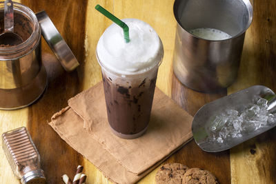 High angle view of coffee cup on table