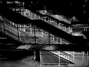 Staircase with railings in background
