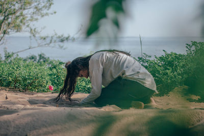 Woman dancing in beach