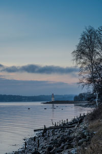 Traeskohage lighthouse near vejle at sundown