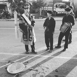 Woman walking on road