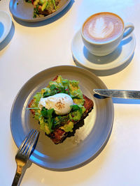 High angle view of breakfast served on table